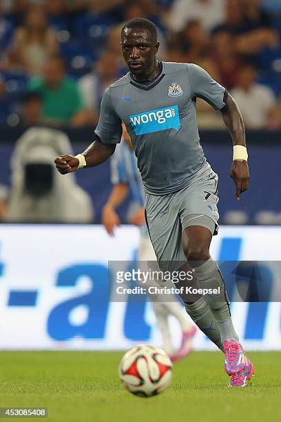 Moussa Sissoko of Newcastle United runs with the ball during the match between FC Malaga and Newcastle United as part of the Schalke 04 Cup Day at...
