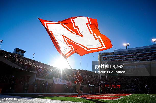 Flag is displayed after the Nebraska Cornhuskers score against the Michigan State Spartans during their game at Memorial Stadium on November 16, 2013...