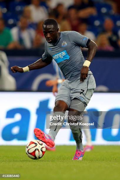 Moussa Sissoko of Newcastle United runs with the ball during the match between FC Malaga and Newcastle United as part of the Schalke 04 Cup Day at...