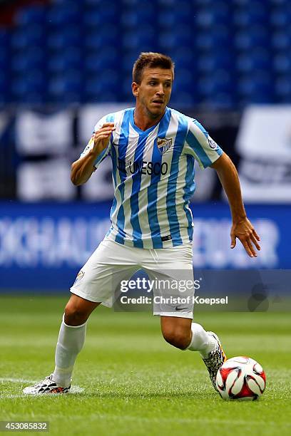 Viktorino Antunes of Malaga runs with the ball during the match between FC Malaga and Newcastle United as part of the Schalke 04 Cup Day at...