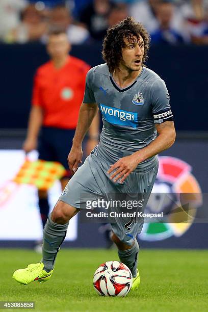 Fabricio Coloccini of Newcastle United runs with the ball during the match between FC Malaga and Newcastle United as part of the Schalke 04 Cup Day...