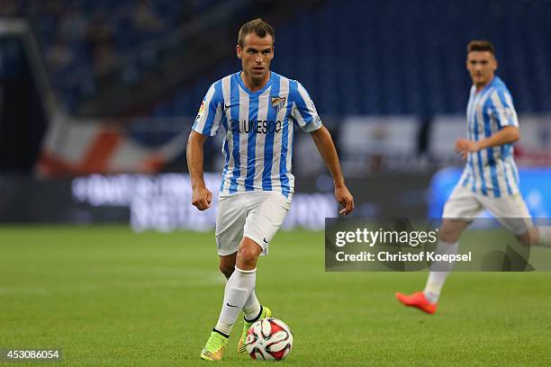 Ignacio Camcho of Malaga runs with the ball during the match between FC Malaga and Newcastle United as part of the Schalke 04 Cup Day at...