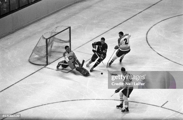 Aerial view of Montreal Canadiens goalie Jacques Plante in action, making save vs New York Rangers at Madison Square Garden. New York, NY 11/1/1959...