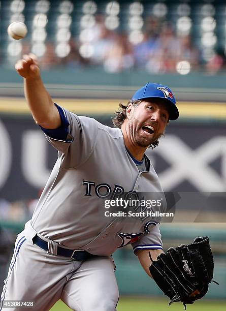 Dickey of the Toronto Blue Jays throws a pitch during the first inning of their game with the Houston Astros at Minute Maid Park on August 2, 2014 in...