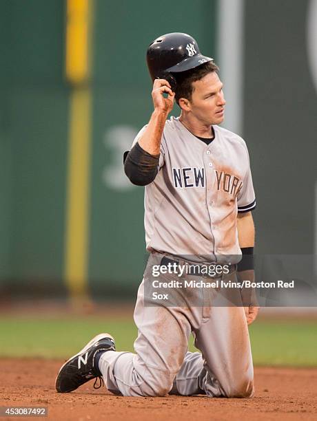 Stephen Drew of the New York Yankees reacts after being picked off of second base by the Boston Red Sox in the seventh inning on August 2, 2014 at...