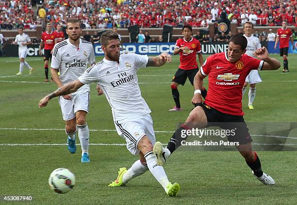 Javier "Chicharito" Hernandez of Manchester United in action with Sergio Ramos of Real Madrid during the pre-season friendly match between Manchester...