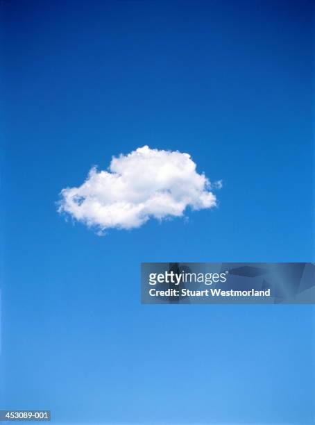 single altocumulus cloud in blue sky - cloud sky stock-fotos und bilder