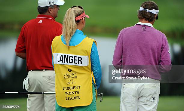 Christina Langer wears the Charles Schwab yellow bib indicating that her father, Bernhard Langer of Germany is the current points leader as they...