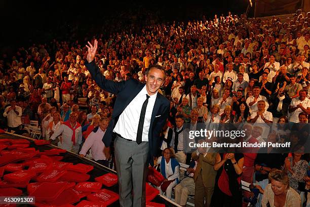 Actor Elie Semoun poses after the traditional throw of cushions at the final of 'Le placard' play at the 30th Ramatuelle Festival : Day 2, on August...