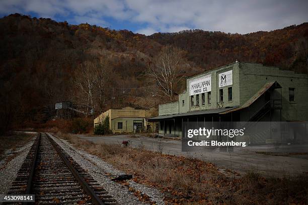 An abandoned building belonging to the Manalapan Mining Co. Stands near a railroad spur track near Evarts, Kentucky, U.S., on Thursday, Nov. 7, 2013....