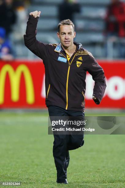 Hawks coach Alastair Clarkson celebrates the win during the round 19 AFL match between the Hawthorn Hawks and the Western Bulldogs at Aurora Stadium...