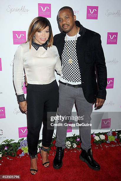 Actress Tisha Campbell and Duane Martin arrive at the Vivica A. Fox 50th Birthday party at Philippe Chow on August 2, 2014 in Beverly Hills,...