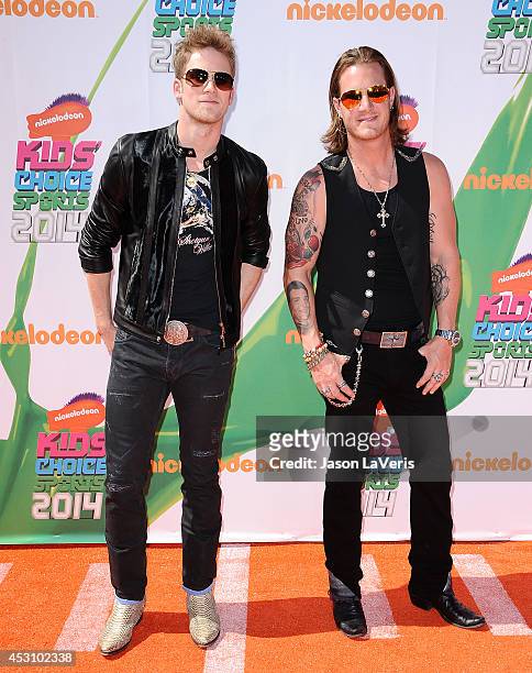 Brian Kelley and Tyler Hubbard of Florida Georgia Line attend the 2014 Nickelodeon Kids' Choice Sports Awards at Pauley Pavilion on July 17, 2014 in...