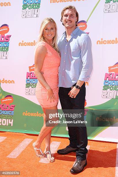 Surfer Bethany Hamilton and Adam Dirks attend the 2014 Nickelodeon Kids' Choice Sports Awards at Pauley Pavilion on July 17, 2014 in Los Angeles,...