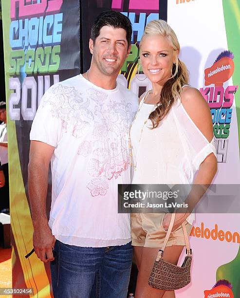 Casey Daigle and Jennie Finch attend the 2014 Nickelodeon Kids' Choice Sports Awards at Pauley Pavilion on July 17, 2014 in Los Angeles, California.