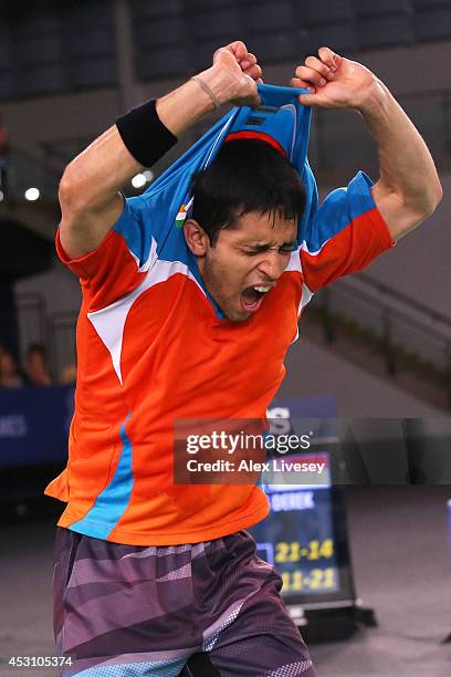 Kashyap Parupalli of India celebrates winning gold in the Men's Singles Gold Medal Match against Derek Wong of Singapore at Emirates Arena during day...