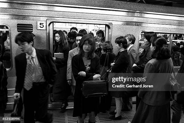 Mizuho Tohno, a nineteen-year-old porn actress, exits from a train at Shinjuku Station after finishing shooting scenes for a movie production in...