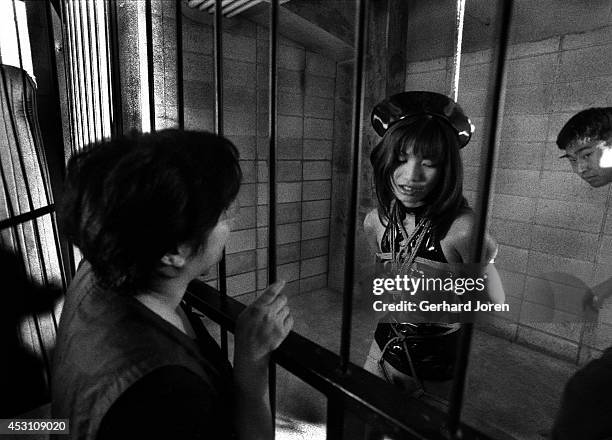 Mizuho Tohno, a nineteen-year-old porn actress, during the shooting of a scene, in the making of a movie in Tokyo. She is being instructed by the...