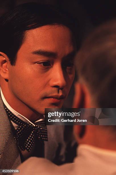 Hong Kong actor Leslie Cheung Kwok Wing with Chinese actor Xie Tian, during the filming of 'Temptress Moon' in Shanghai Film Studios.