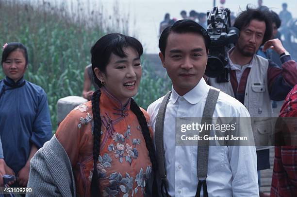 Chinese movie actress Gong Li with Hong Kong actor Leslie Cheung Kwok Wing during the filming of 'Temptress Moon'.