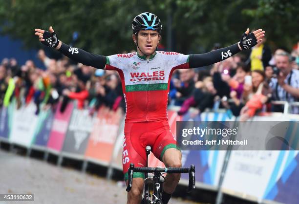 Geraint Thomas of Wales celebrates winning the gold medal in the Men's Road Race during day eleven of the Glasgow 2014 Commonwealth Games on August...