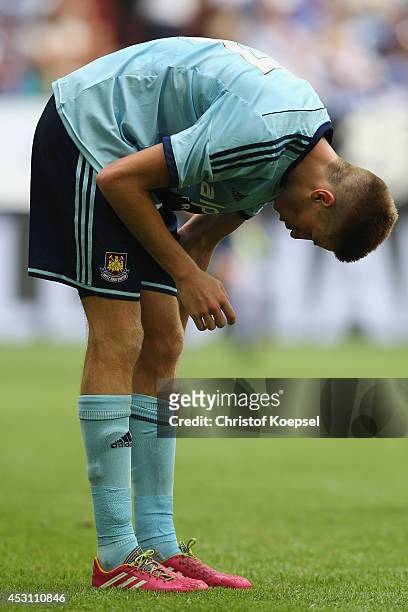Reece Burke of West Ham United looks dejected after losing 0-2 the match between FC Malaga and West Ham United as part of the Schalke 04 Cup Day at...