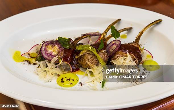 Lamb ribs with radish, "Chile de agua", Mexican green sauce and guacamole, prepared and served by Alejandro Ruiz, chef of the "Casa Oaxaca"...