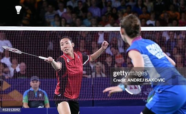 Canada's Michelle Li hits a return against Scotland's Kirsty Gilmour during the gold medal final of the women's singles badminton competition at the...