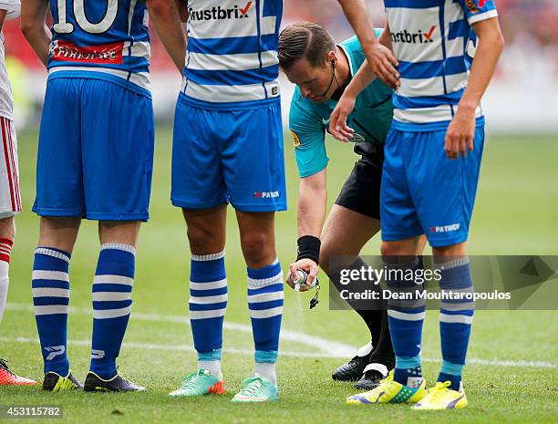 Referee, Danny Makkelie marks the wall line with Vanishing foam spray during the 19th Johan Cruijff Shield match between Ajax Amsterdam and PEC...