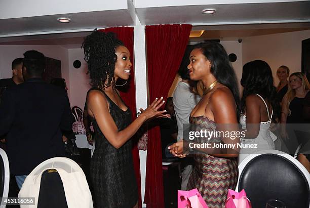 Actress/singers Brandy and Tatyana Ali attend the Vivica A. Fox 50th birthday celebration at Mr. Chow on August 2, 2014 in Los Angeles, California.