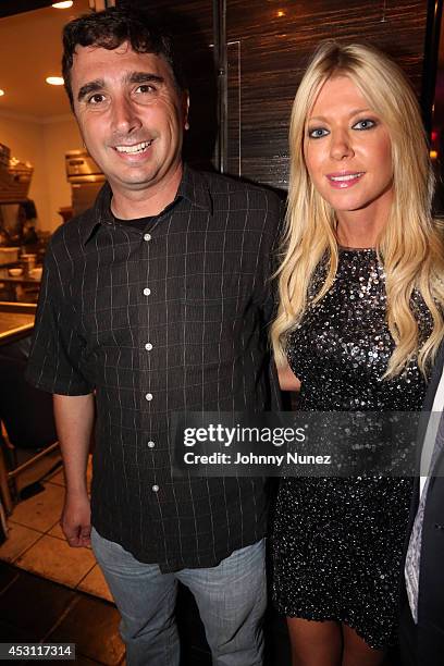 Director Anthony C. Ferrante and actress Tara Reid attend the Vivica A. Fox 50th birthday celebration at Mr. Chow on August 2, 2014 in Los Angeles,...