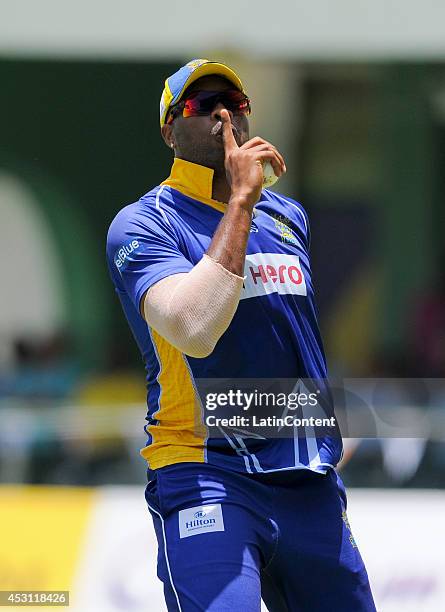 Kieron Pollard of Barbados Tridents celebrates taking the catch to dismiss Andre Russell of Jamaica Tallawahs during a match between Jamaica...
