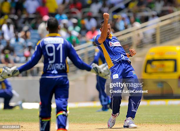 Rayad Emrit of Barbados Tridents celebrates taking 3 Jamaica Tallawahs wickets for 35 runs during a match between Jamaica Tallawahs and Barbados...