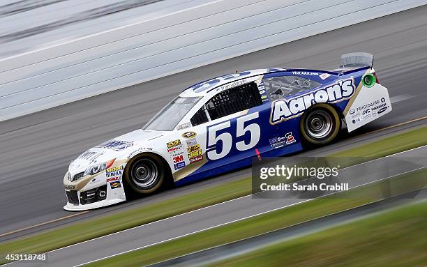 Brian Vickers, driver of the Aaron's Dream Machine Toyota, drives during the NASCAR Sprint Cup Series GoBowling.com 400 at Pocono Raceway on August...