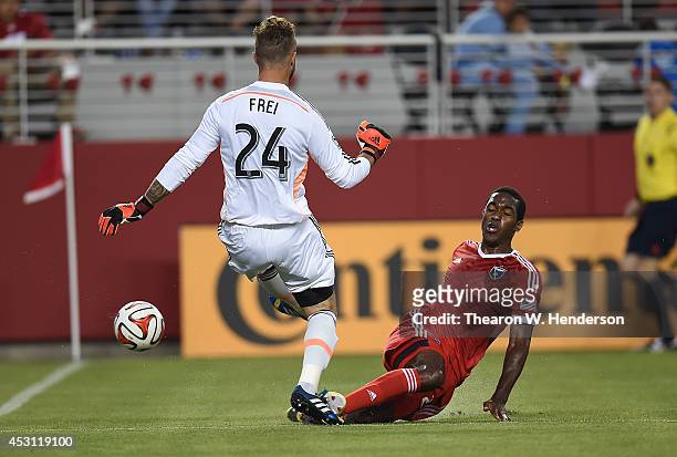 Goalkeeper Stefan Frei of the Seattle Sounders FC blocks the shot of Atiba Harris of the San Jose Earthquakes during the first half of the MLS Soccer...