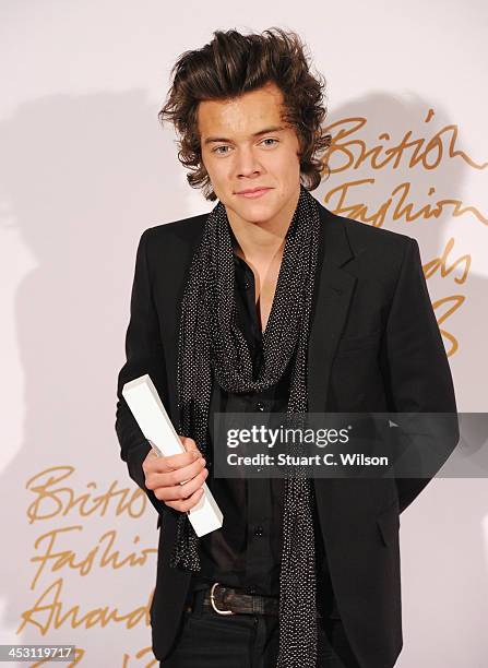 Harry Styles with the British Style bought to you by Vodaphone Award poses in the winners room at the British Fashion Awards 2013 at London Coliseum...