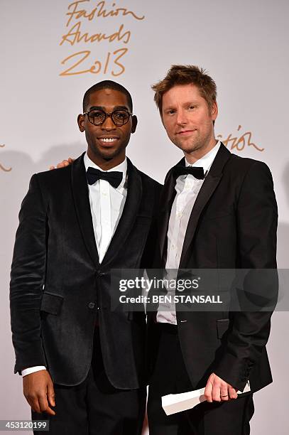 British rapper Tinie Tempah poses with Christopher Bailey , Chief Creative Officer of Burberry, winner of the Menswear Designer of the Year at the...