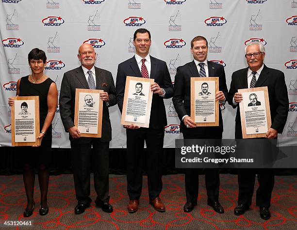 Cindy Curley, Peter Karmanos, Jr., Bill Guerin, Doug Weight and Ron Mason pose for a photo at a media meet and greet prior to their USA Hockey Hall...