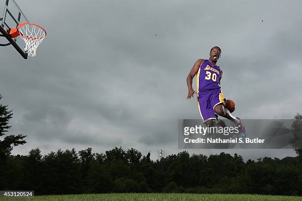 Julius Randle of the Los Angeles Lakers poses for a portrait during the 2014 NBA rookie photo shoot on August 3, 2014 at the Madison Square Garden...