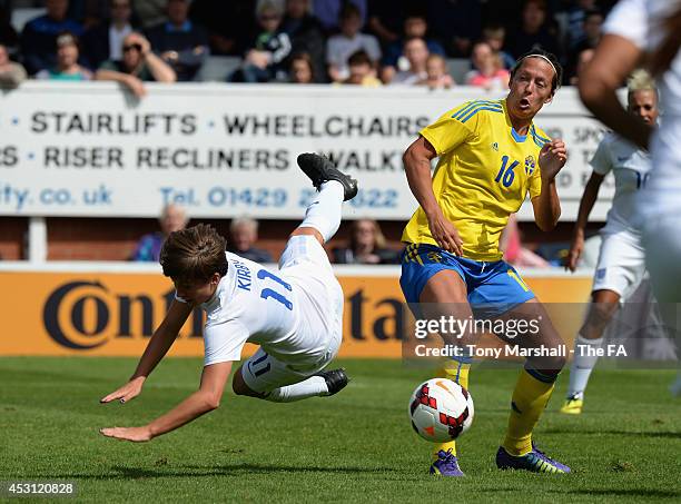 Fran Kirby of England tackled by Lina Nilsson of Sweden during the Women's International Friendly match between England and Sweden at Victoria Park...