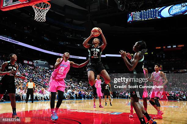 Charde Houston of the New York Liberty shoots the ball against the Atlanta Dream on August 3, 2014 at Philips Arena in Atlanta, Georgia. NOTE TO...