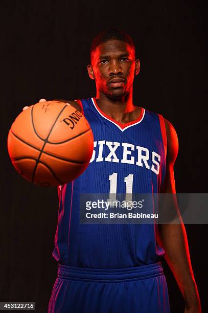 Joel Embiid of the Philadelphia 76ers poses for a portrait during the 2014 NBA rookie photo shoot on August 3, 2014 at the Madison Square Garden...
