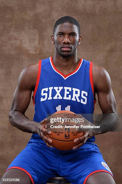 Joel Embiid of the Philadelphia 76ers poses for a portrait during the 2014 NBA rookie photo shoot on August 3, 2014 at the Madison Square Garden...