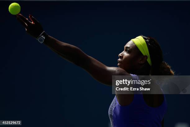 Serena Williams of the USA serves to Angelique Kerber of Germany in the finals of the Bank of the West Classic at the Taube Family Tennis Stadium on...