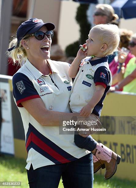 Autumn Phillips laughs as she holds daughter Isla Phillips during theFestival of British Eventing at Gatcombe Park on August 03, 2014 in...