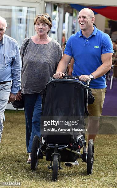 Mike Tindall enjoys an ice cream during the Festival of British Eventing at Gatcombe Park on August 03, 2014 in Minchinhampton, England.