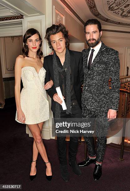 Alexa Chung, Harry Styles, winner of the British Style Award, and Jack Guinness attend the British Fashion Awards 2013 at London Coliseum on December...