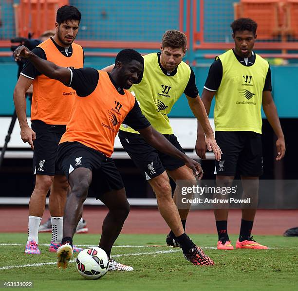 Steven Gerrard and Kolo Toure of Liverpool in action during an open training session at Sunlife Stadium on August 3, 2014 in Miami, Florida.