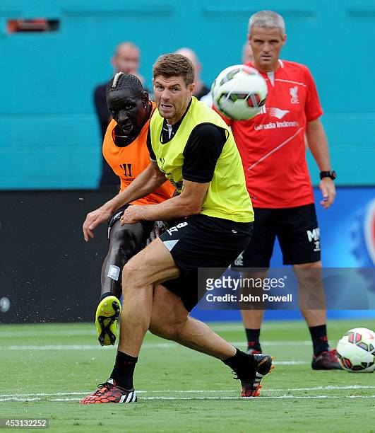Mamadou Sakho and Steven Gerrard of Liverpool in action during an open training session at Sunlife Stadium on August 3, 2014 in Miami, Florida.