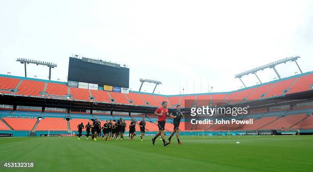 Steven Gerrard of Liverpool leads the team during an open training session at Sunlife Stadium on August 3, 2014 in Miami, Florida.